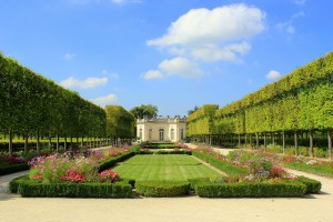 A view of the gardens surrounding the Petit Trianon