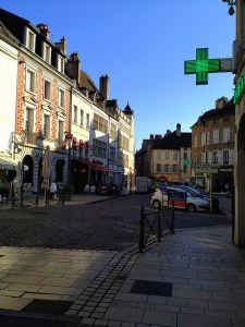The shadows lengthen in Beaune as the daylight fades